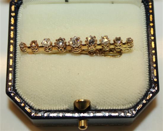 Nine diamond bar brooch